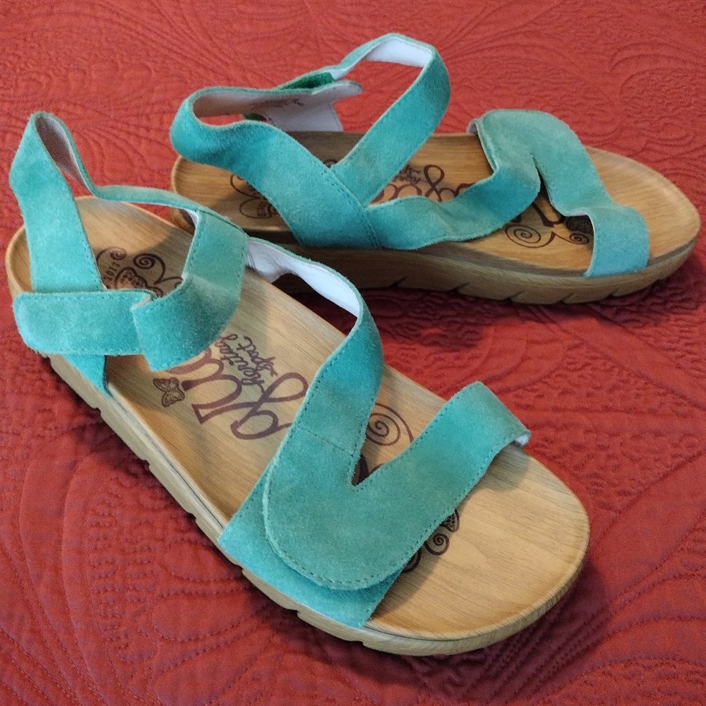 Green suede Alegria sandals
